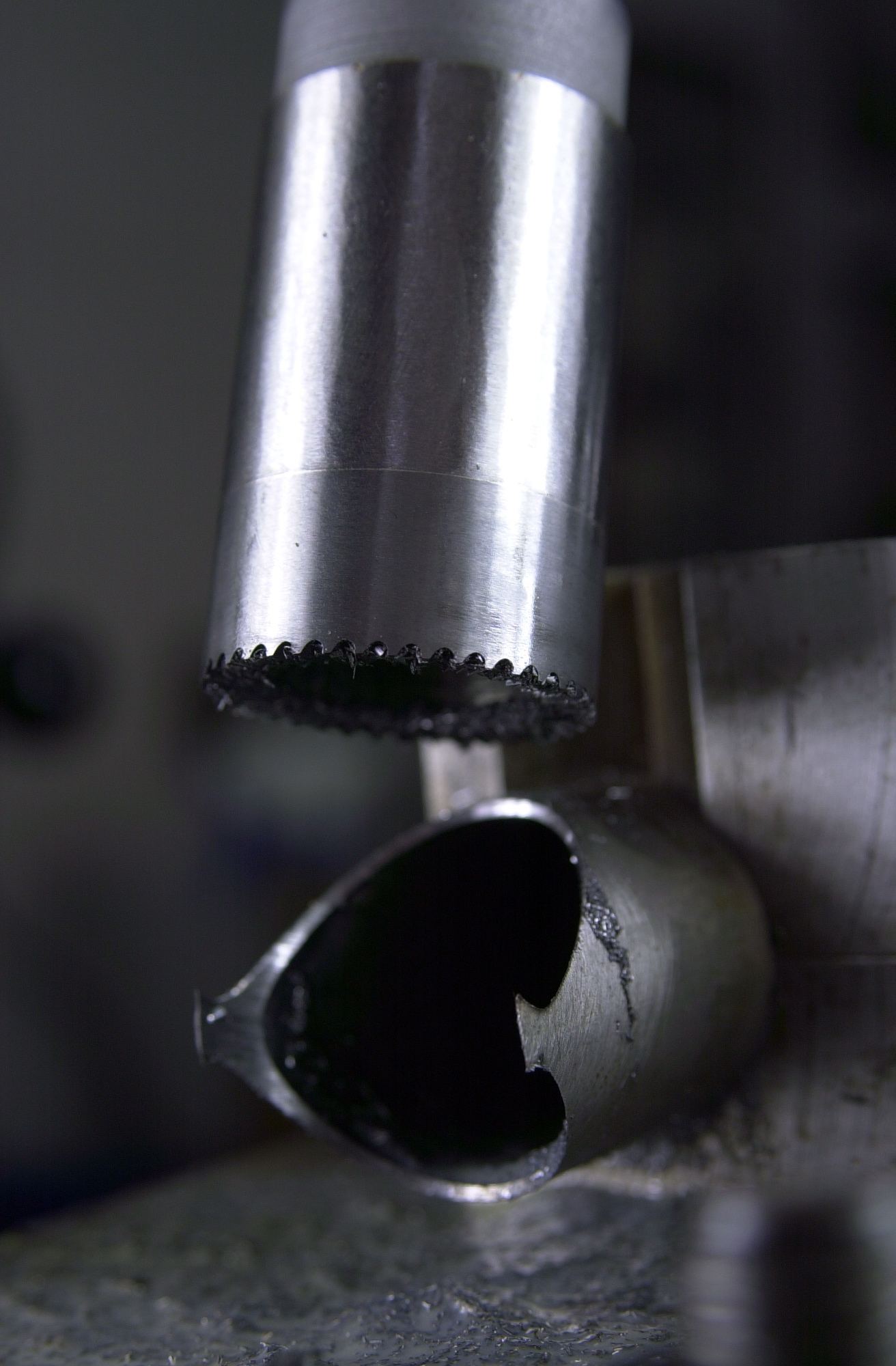Close-up of brazed carbide tube mitre cutter and just mitred Reynolds 631 top tube.