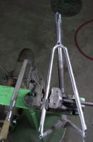 Dropout filing.  Seatstays are clamped in a Cardinal vise with modified vee jaws which rotate about a vertical axis circa 1974 thanks to Stan at EPS.