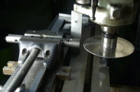 222 seatpost clamp machining.  Slitting the seatpost clamp with a Malco 0.064" x 5" jewelers slotting saw.