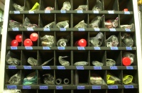 LAN71 Tube Mitre Cutter Inventory Storage Unit.  Also known as a re-purposed old wine bottle bin.  This non-computerized inventory system may be antiquated but it provides ready access to all the sizes of cutters, cutter blanks (cutter blanks are lathe turned from solid PM-T15 high speed steel in the Strawberry shop, then heat treated to HRC 66-67.  Small batches of blanks are precision ground into tube mitre cutters at McKenzie Tool Grinding Co. www.mckenzietool.com and the remainder reside in the storage unit until demand calls for grinding.).  The unit also stores the R8 and 3/4" straight shank arbors for the back threaded cutters.