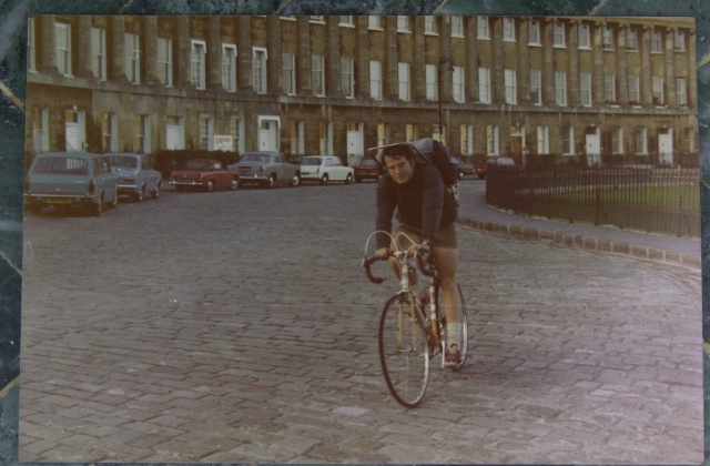 Bath, England 1970.  Photo of yours truly on my new Bob Jackson bike cycling past the Royal Crescent on our bike tour to Devon.  Peter Stoel photo.