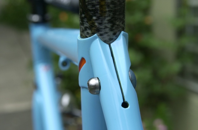 Cristina's frameset 1405.  LAN71 designed integral seatpost binder turned from 7/8" diameter 4130 rod stock.  Clamping force is maintained by a 10mm. button head cap screw.