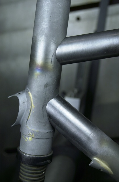 Scott's frame no. 7018.  Top and bottom tube fit-up check prior to lug assembly.  Bottom lug has been tack brazed to head tube and rotated to allow visual check of down tube mitre angle and length while held in the Marchetti frame brazing fixture.