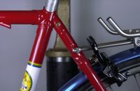 Seat lug and rear rack attachment to wishbone topstay.