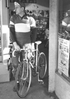 Frans Pauwels leaving his Kissler's Bike Shop on 4th. and S.W. Jefferson, downtown Portland, Oregon.