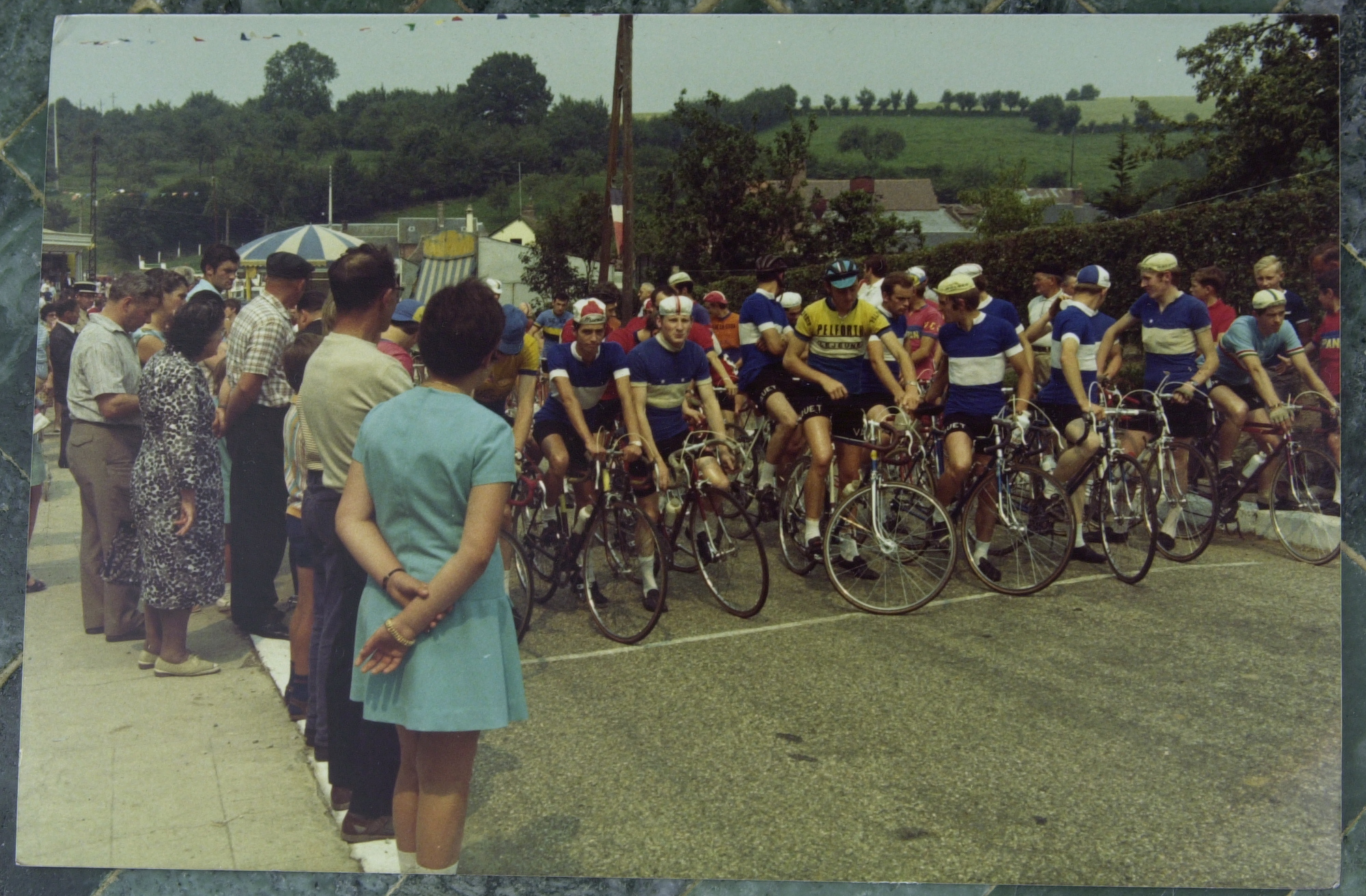 N. France some small town, 1970.  I cycled across northern France and happened on two farming communities holding a joint festival which included a bike race.