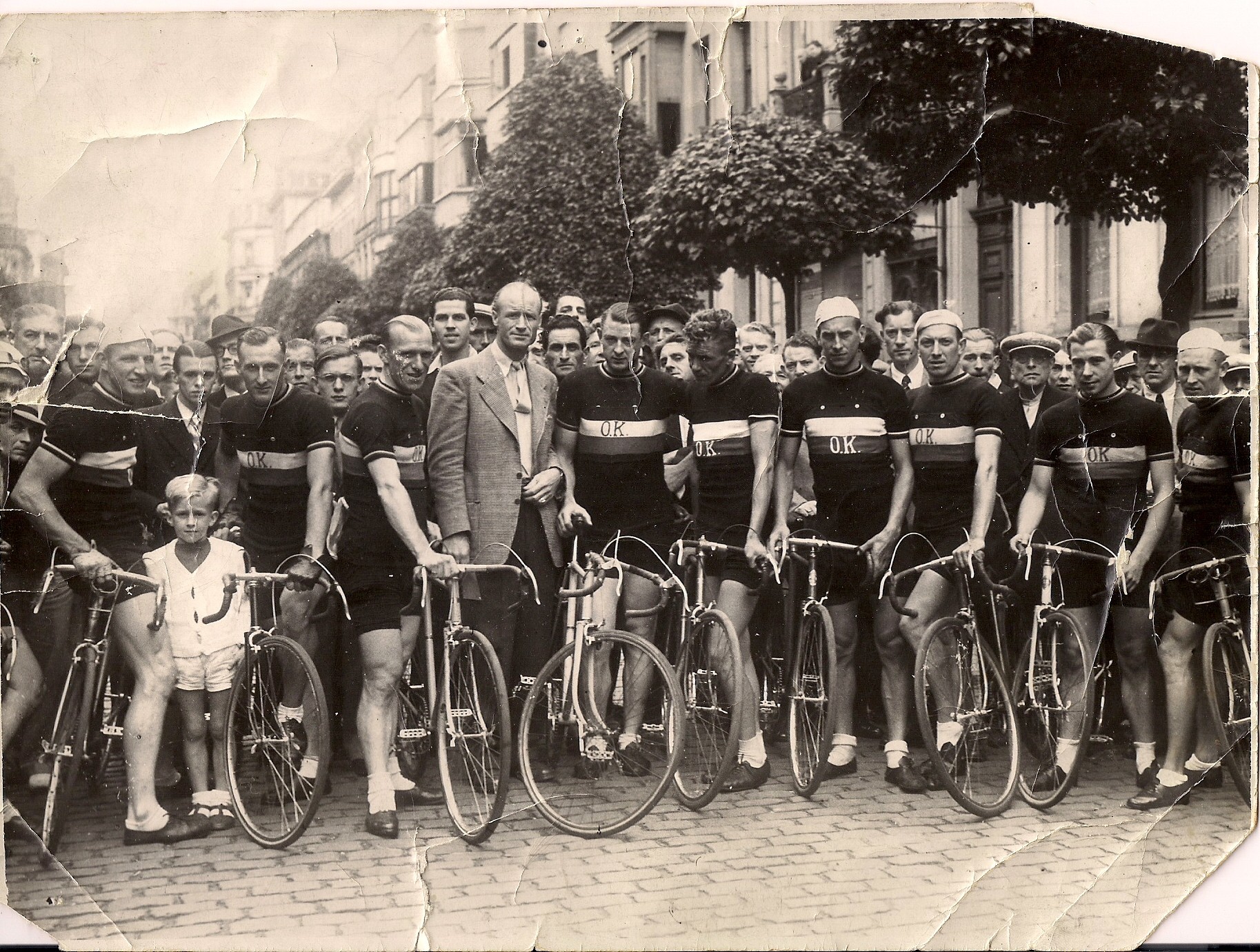OK pro team circa 1947.  Left to right:  Gerrit Schulte, Holland; Albert Hendricks, Belgium; Eugene Kiewit, Belgium; Jos Vinck, Belgium, Cycles O.K. owner and first lugless bike framebuilder; Karel Kaers, Belgium, World Pro Road Champion in 1934 at age 18; Theo Middelkamp, Holland, World Pro Road Champion, 1947 (Frans Pauwels cousin); Frans Pauwels, Holland (emigrated to Portland, Oregon in 1952 and was integral to the development of cycling advocacy and racing in Portland); unknown; Jos Labrosse Belgium; unknown.