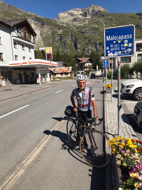 Dr. Marco summiting Malojapass, Italy on his Strawberry road bike.