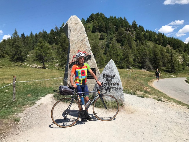 Dr. Marco summiting Passo Del Mortirolo, Italy on his Strawberry road bike.