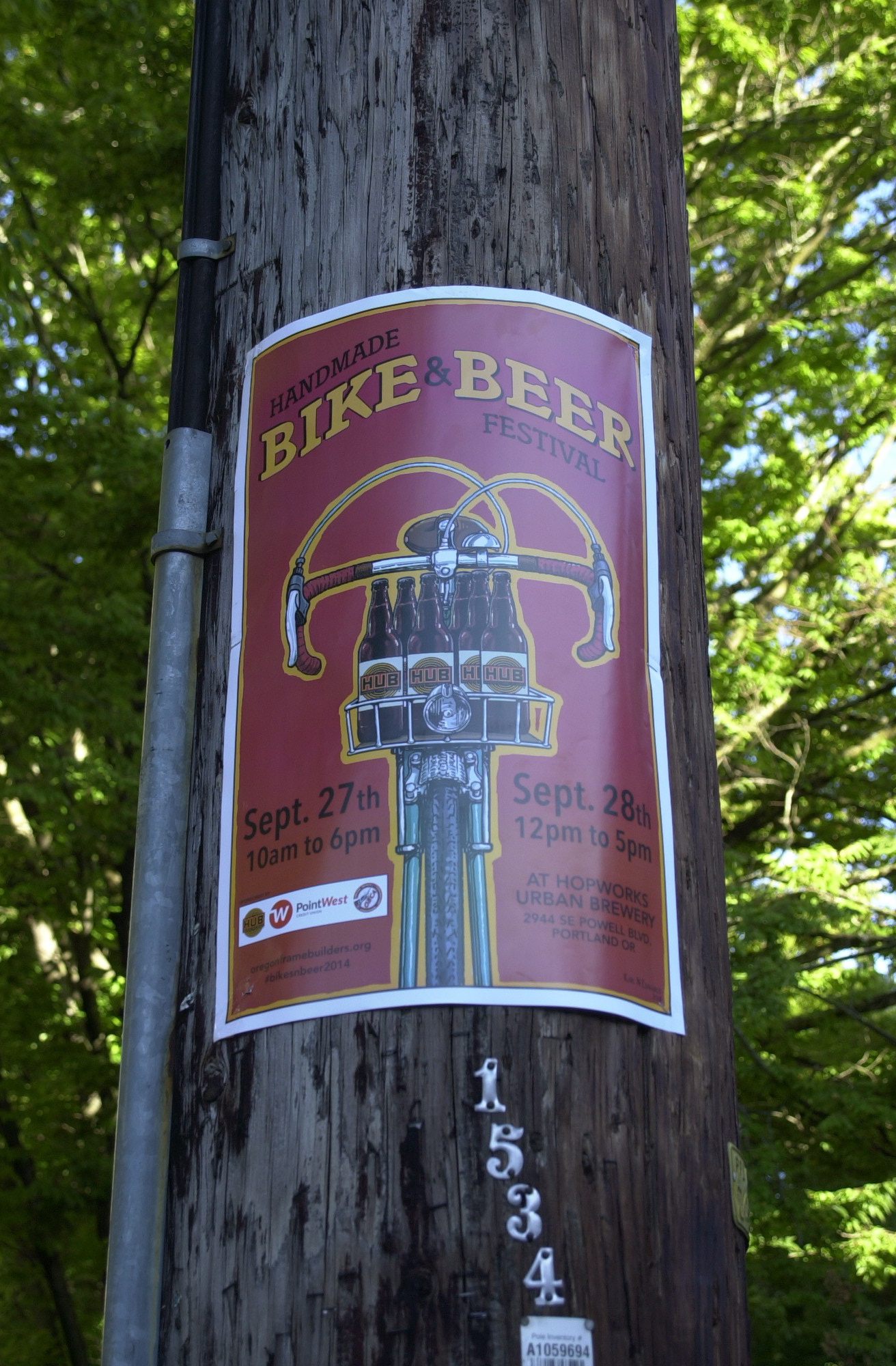 2014 Oregon Handmade Bike and Beer Festival poster on the telephone pole at SW 17th. and Market St.