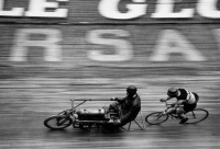 Racing behind the derny.  Board track racing circa 1930's.